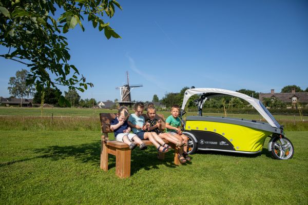GoCab bike and children at mill outside